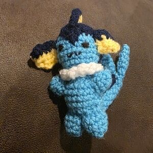 Handmade Vaporeon amigurumi, a crocheted plush toy
